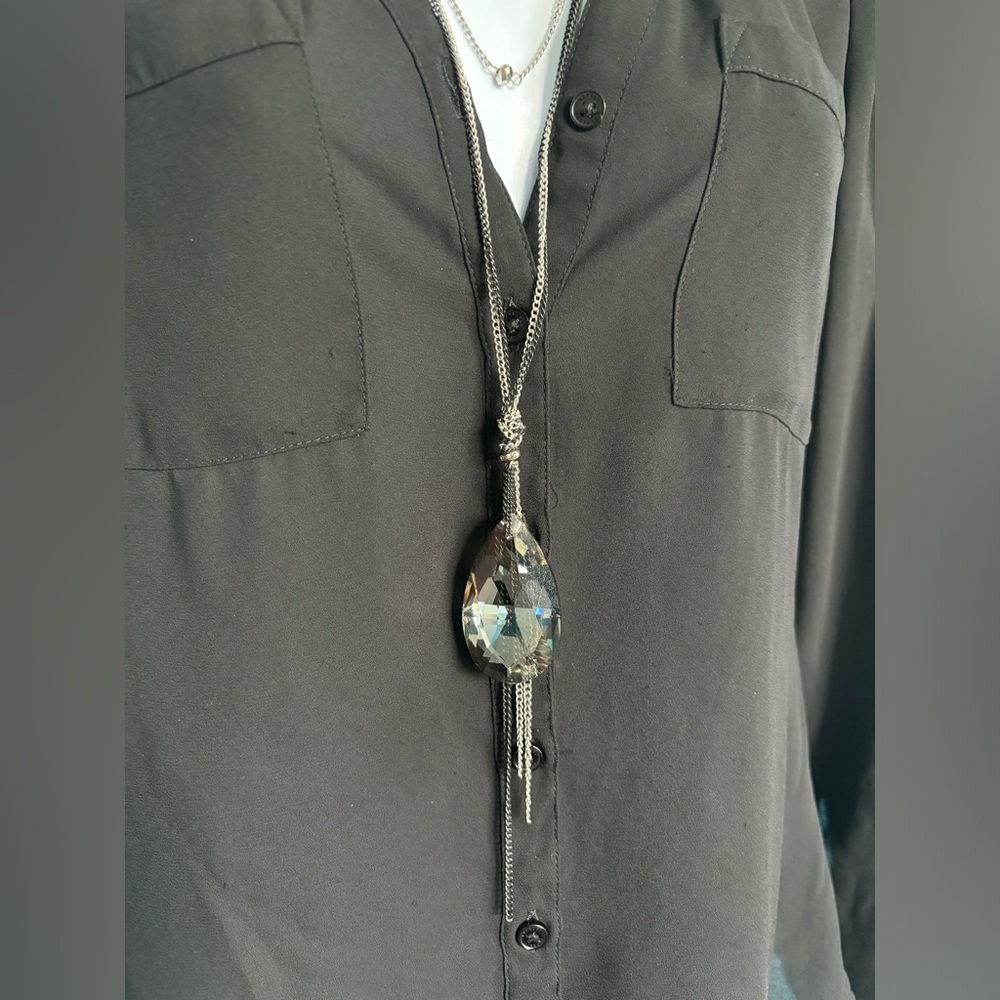Express multi strand layered necklace with beautiful pendant